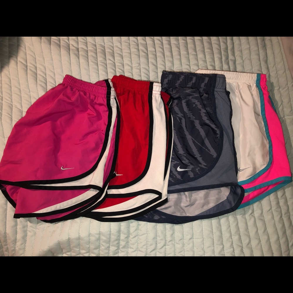 4 pair Nike shorts! All size Medium!